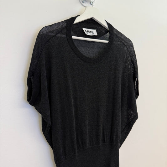 Martin Margiela black dress with bat model top