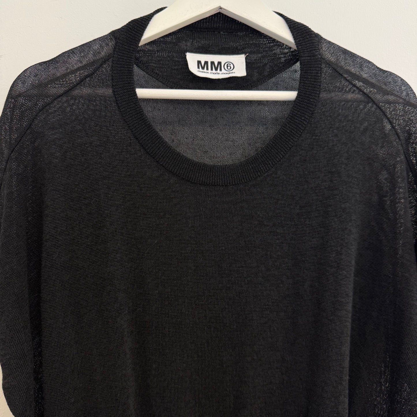 Martin Margiela black dress with bat model top