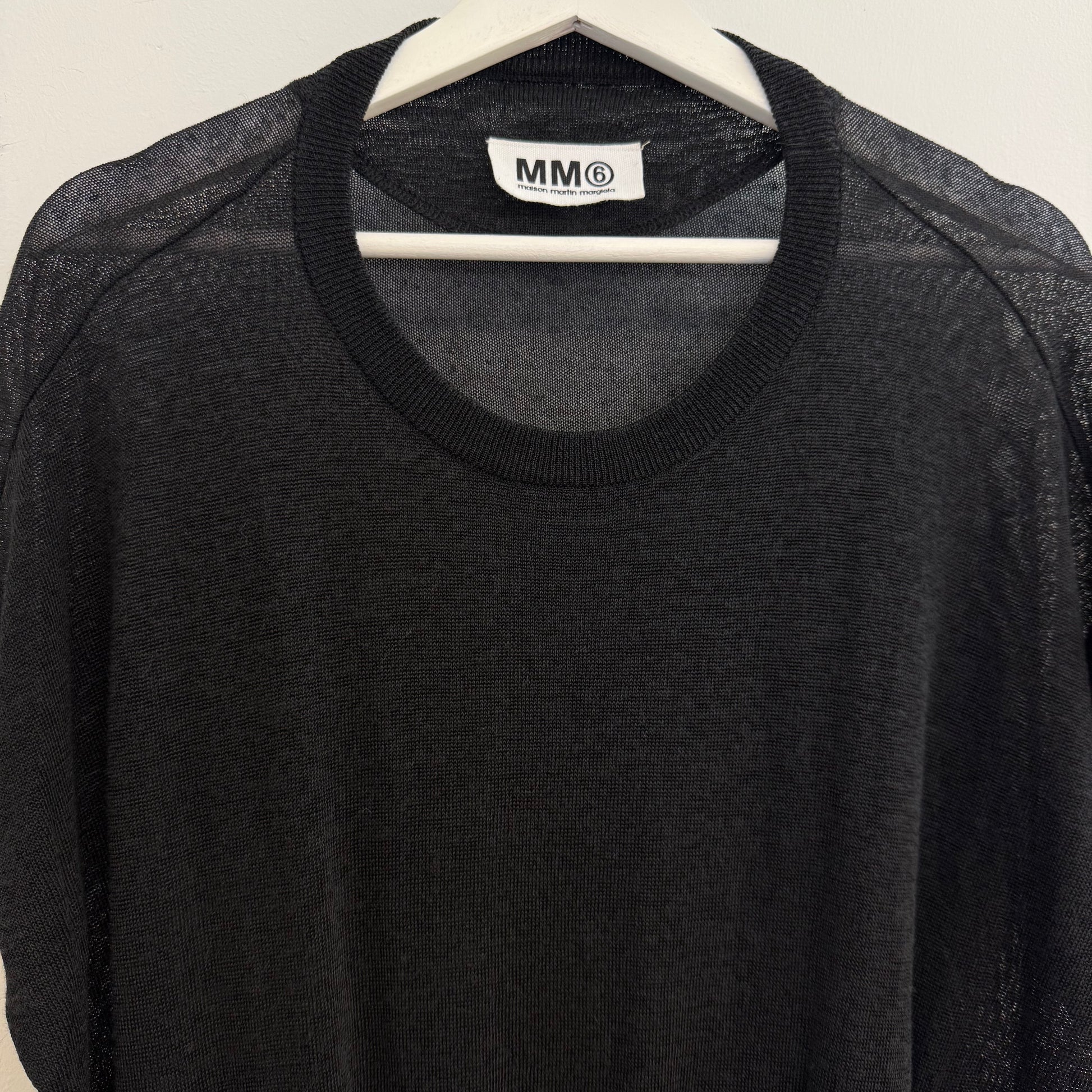Martin Margiela black dress with bat model top