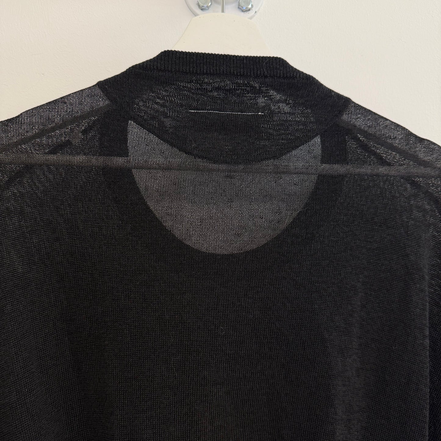 Martin Margiela black dress with bat model top