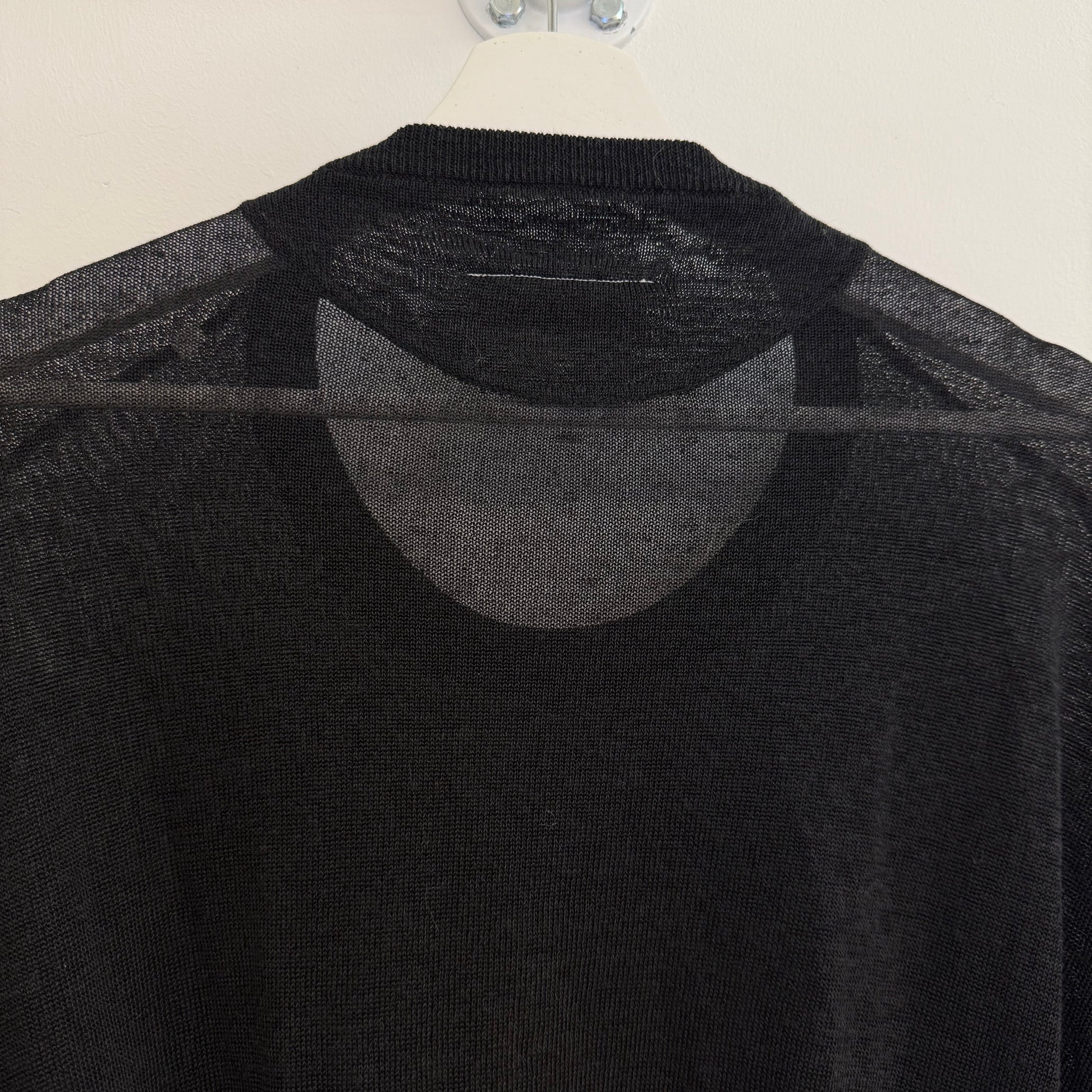 Martin Margiela black dress with bat model top